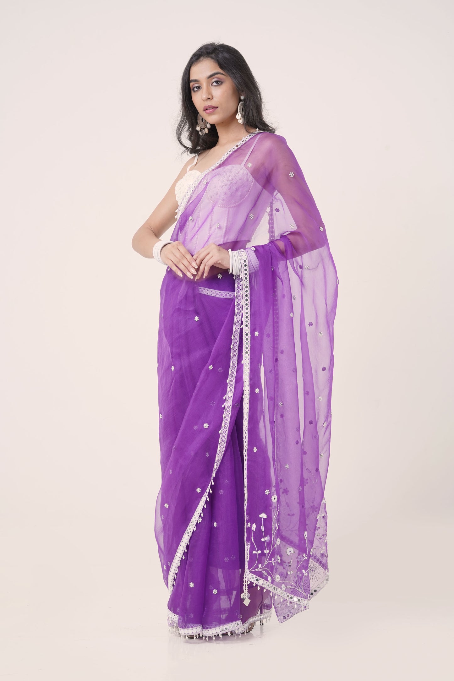 Plum Organza Saree with Hand-Embroidered Pearl Corset Blouse