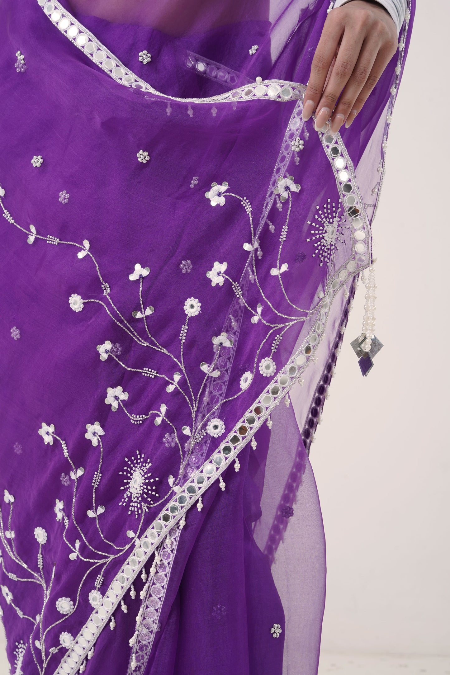 Plum Organza Saree with Hand-Embroidered Pearl Corset Blouse