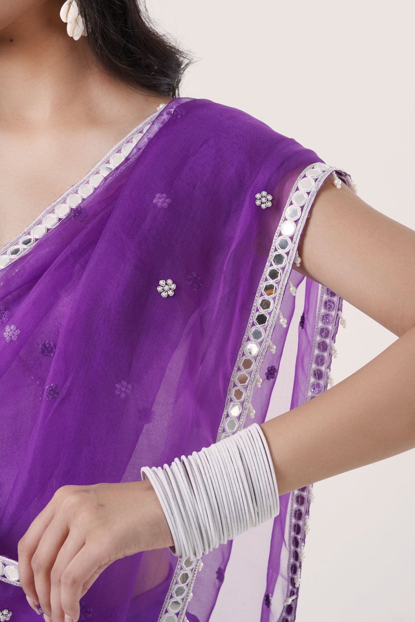 Plum Organza Saree with Hand-Embroidered Pearl Corset Blouse