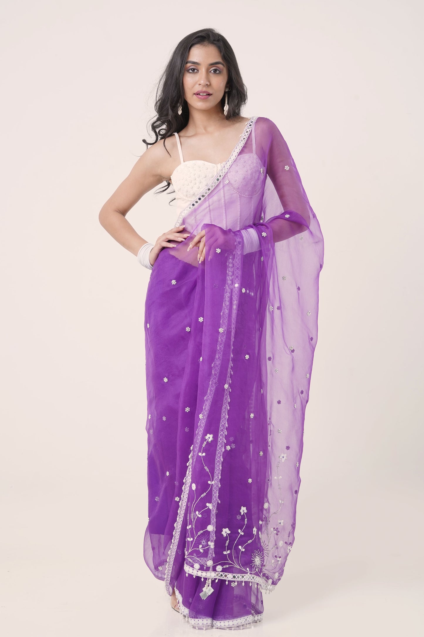 Plum Organza Saree with Hand-Embroidered Pearl Corset Blouse